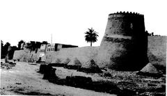 Side view of Qatif Castle showing the sea gateway between two towers in 1937