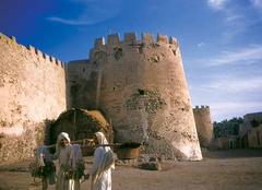 Street view near Qatif Castle in 1940s Saudi Arabia