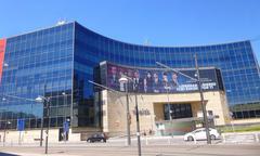 Modern glass facade of Edificio Bami building in Bilbao