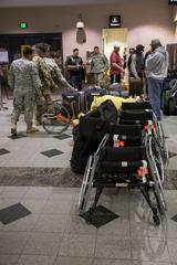 U.S. Army active duty and veteran Warrior Trial athletes picking up equipment at El Paso International Airport, Texas, February 2016