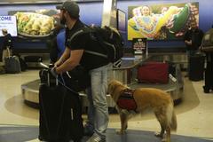 U.S. Army athlete with luggage at El Paso International Airport waiting to participate in Warrior Games 2016 at Fort Bliss Texas