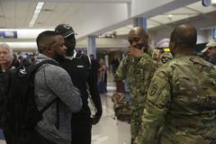 U.S. Army active duty and veterans receiving information from Major Rodney Lamberson at El Paso International Airport, Texas, February 26, 2016