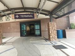 El Paso Airport terminal sign with gate information and directional arrows