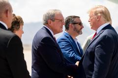 President Donald J. Trump and First Lady Melania Trump disembarking Air Force One at El Paso International Airport greeted by Texas officials