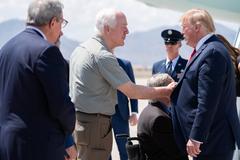 President Donald J. Trump and First Lady Melania Trump disembarking Air Force One at El Paso International Airport on Aug 7, 2019, greeted by Texas officials