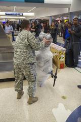 U.S. Army active duty and veteran Warrior Trial athletes gathering equipment at El Paso International Airport