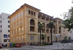 University of Bozen Bolzano modern academic building with mountain backdrop