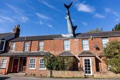 The Headington Shark sculpture on a rooftop in Oxfordshire
