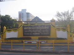 Chiang Mai Rajabhat University campus in Chiang Mai, Thailand with lush greenery and scenic hills in background