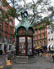 Kiosk at Kultorvet square in Copenhagen with bicycles parked nearby