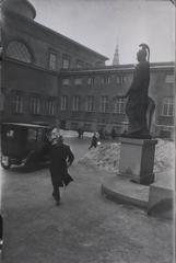 Carl Albert Mülertz, fire chief and engineer, walking near Dronningeporten with Thorvaldsen's Minerva statue in the background