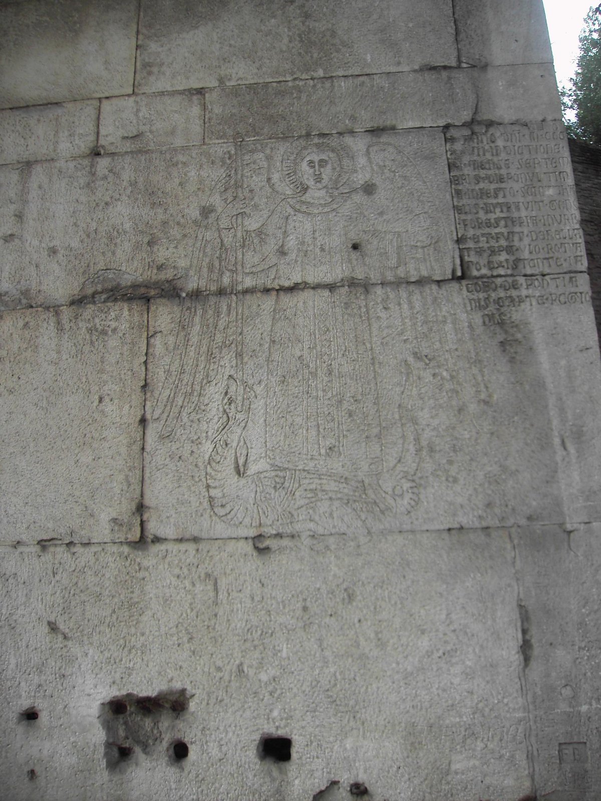Engraving of Archangel Gabriel on Porta San Sebastiano in Rome, 1327