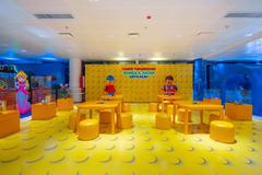 LEGO zone at the National Library of El Salvador with colorful LEGO structures and bookshelves