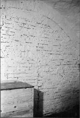 Wall inside the Västerås Cathedral's porch area with detailed stonework and historical architecture