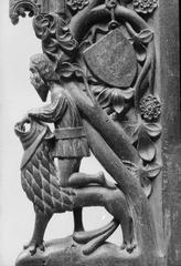 Interior detail of Västerås Cathedral bench end showing Samson fighting the lion
