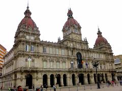 A Coruña city hall building exterior with clear blue sky
