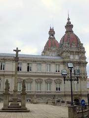 A Coruña city hall building under a clear blue sky