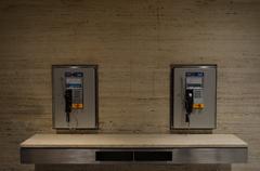Bell branded pay phones in a food hall
