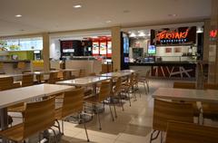 Interior view of TD Centre Food Hall with seating area and food vendors