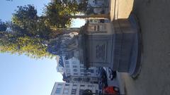 Nieuwe Graanmarkt street in Brussels with historic buildings and people walking