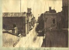 Historic Strada Reale street in Valletta with Knights Foundry left and Casa della Giornata right, St Elmo lighthouse in distance, 1859