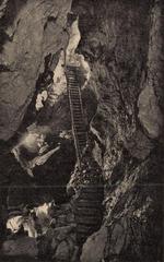 Interior view of Színház Room in Pál-völgyi Cave showcasing stalactites and stalagmites