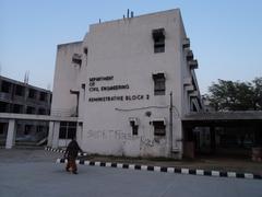 Departmental buildings at NIT Jalandhar campus with modern architecture and clear blue sky