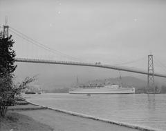 RMS Empress of Canada ship sailing under Lions Gate Bridge in Vancouver, 1939