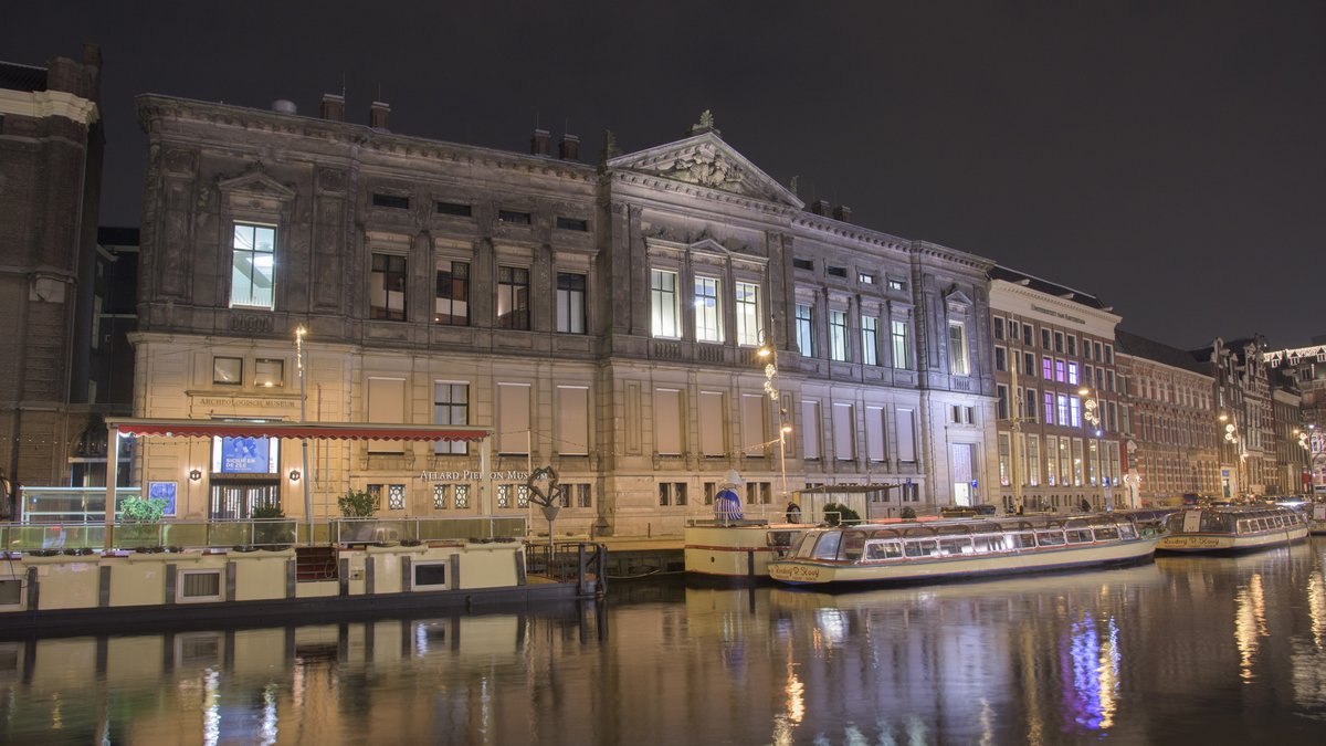 Allard Pierson Museum illuminated at night in Amsterdam