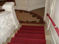 Interior view of Ronacher theatre showing descending Kaiserstairs