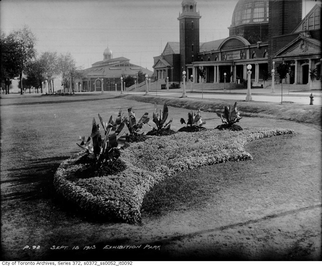 Historic Government Building in 1913 with classical architecture and surrounding trees