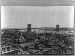 Distant view of Brooklyn Bridge spanning East River in New York City