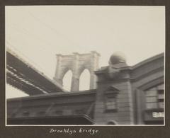 Brooklyn Bridge seen from the water in New York, historic black and white photo from 1928