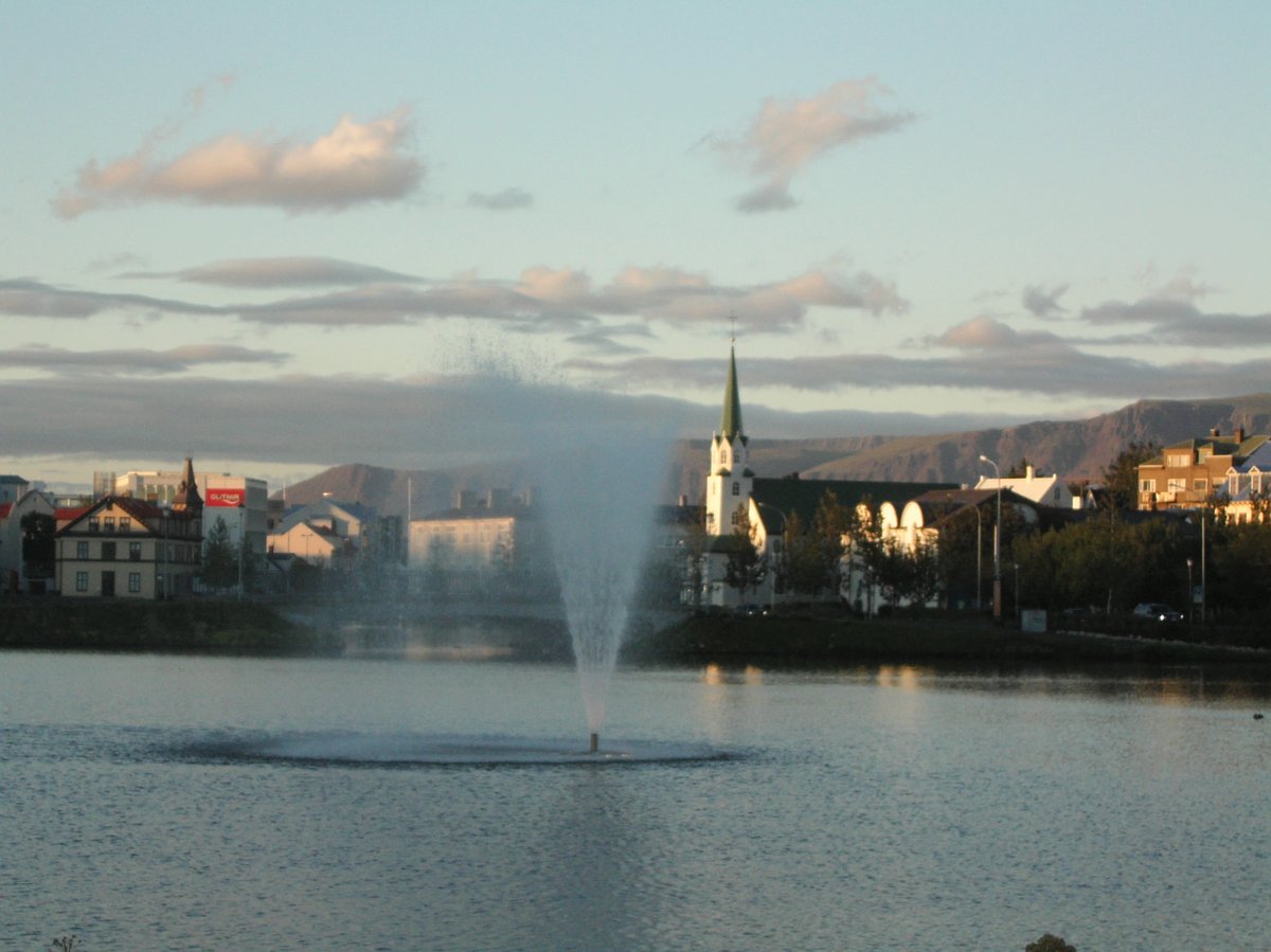 Cityscape of Reykjavik in August 2006 showing colorful buildings and a calm waterfront