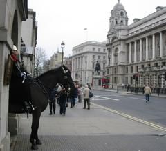Horse Guards Parade building in Whitehall London with Union Jack flag on flagpole