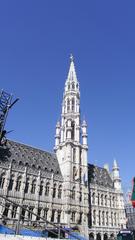 Brussels cityscape with prominent tall buildings and modern architecture under blue sky