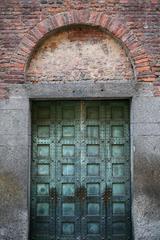 Door of San Vincenzo in Prato, Milan, Italy