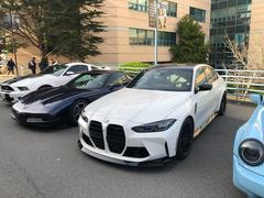 Car meetup event at San Francisco State University with vintage and custom cars