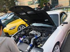 Vintage car meetup at San Francisco State University featuring classic cars and attendees on October 26, 1943