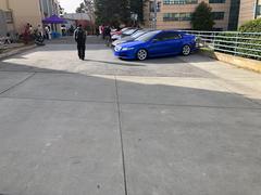 Car meetup at San Francisco State University with classic and customized vehicles