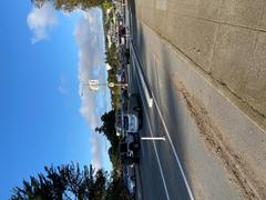 Streets of San Francisco State University with people walking and colorful buildings