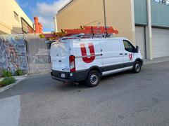Ford Transit cable van parked at San Francisco State University