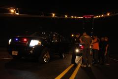 Incident command team discussing reopening the Ambassador Bridge after a bomb threat closure