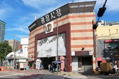 Bustling Gwangjang Market in Seoul with vibrant stalls and shoppers