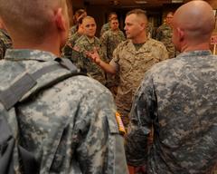 U.S. Marine Corps Gen. James E. Cartwright speaking with U.S. service members at Brook Army Medical Center in San Antonio, Texas