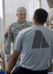 Chief of Staff of the Army Gen. George W. Casey Jr. talking with a patient at Brooke Army Medical Center