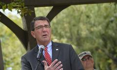 Deputy Secretary of Defense Ashton B. Carter awarding Purple Heart medals at Brook Army Medical Center ceremony
