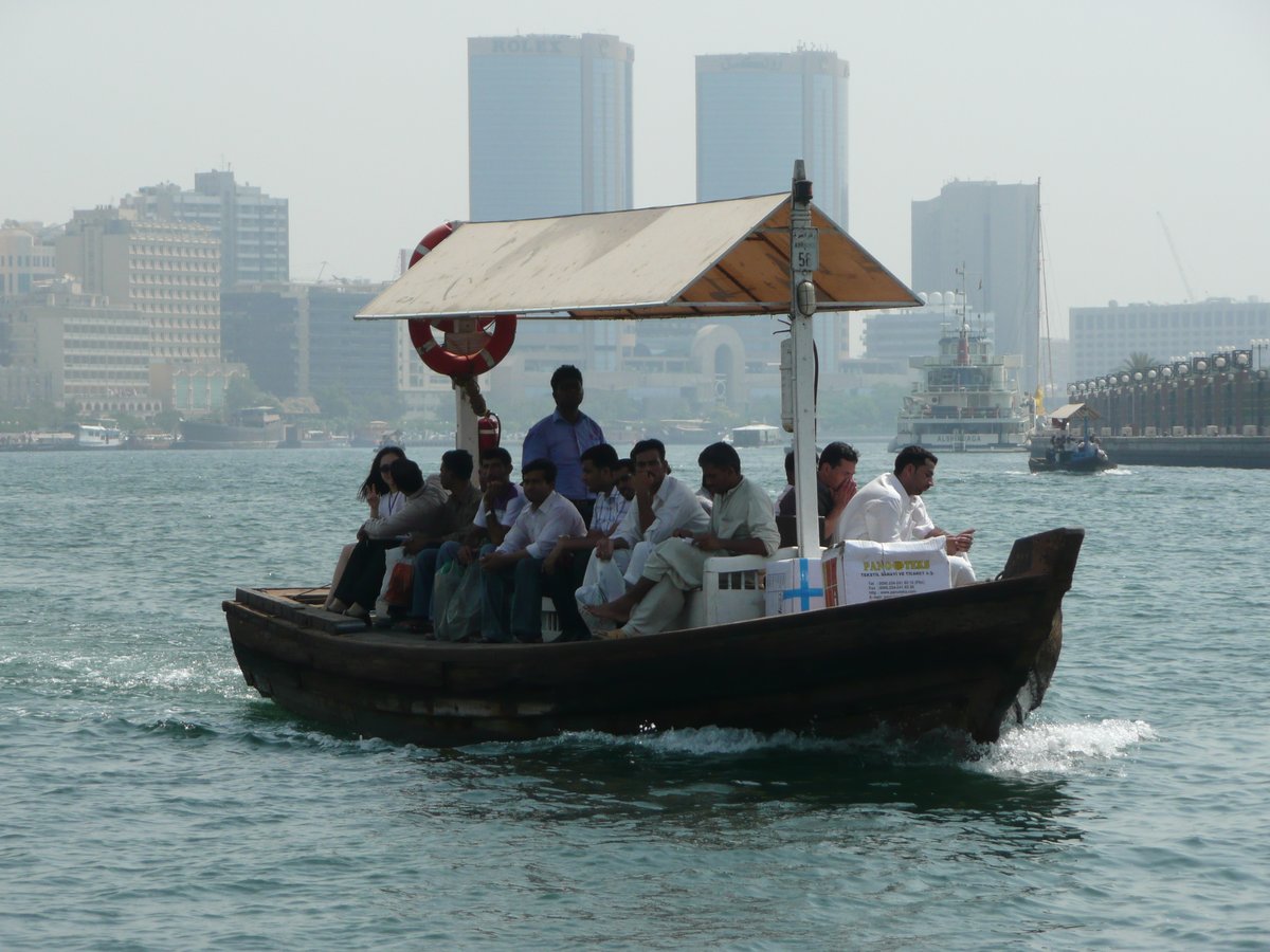 Abra boat with passengers on Dubai Creek