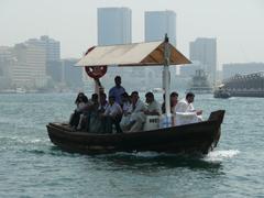 Abra boat with passengers on Dubai Creek