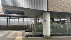 Hanshin Sakuragawa Station escalator entrance in Osaka
